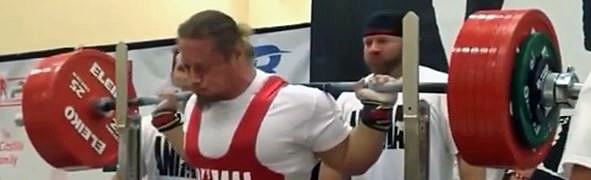 Here Dan Green demonstrates the bent wrist squat grip technique. This technique necessitates wrist wraps.
